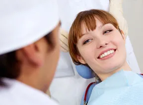 Smiling Patient in Chair